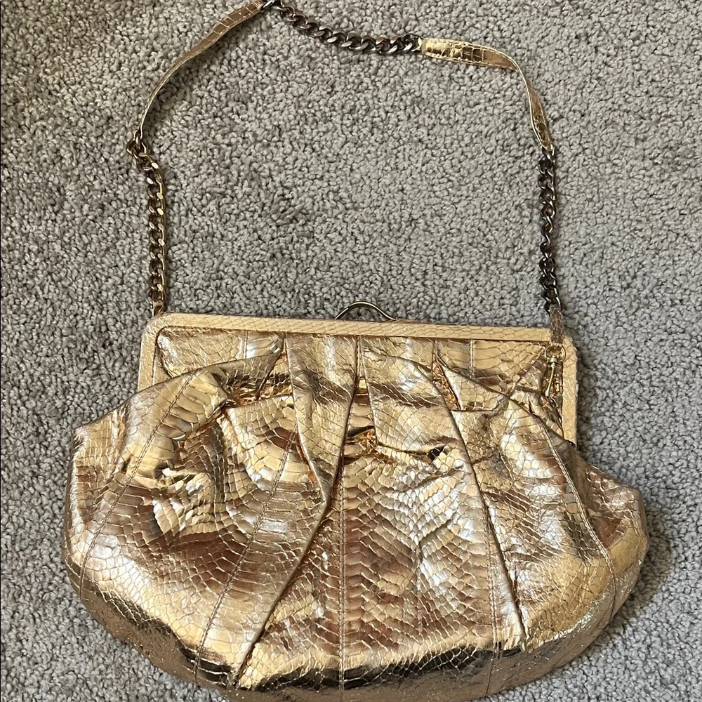 Luxurious Gold metallic Textured Clutch bag with Chain Strap - Picture 1 of 4